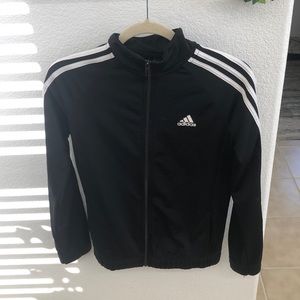 Black and white adidas track suit